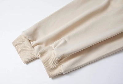 Beige sweatpants on a white background