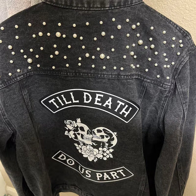 Black denim jacket with pearl embellishments and 'Till Death Do Us Part' text and design.