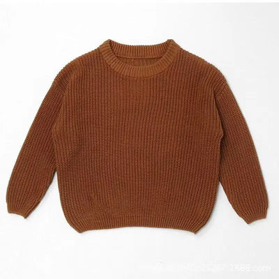 Brown knitted sweater on a white background