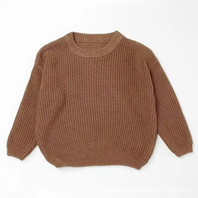 Brown knitted sweater on a white background