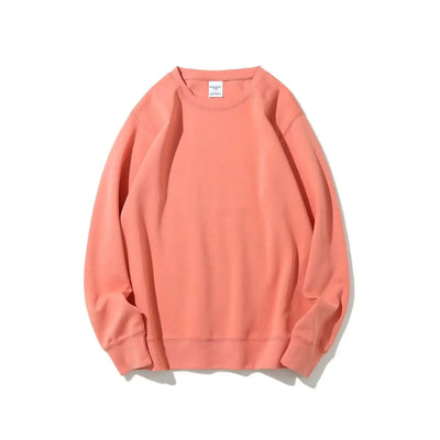 Peach-colored sweatshirt on a white background