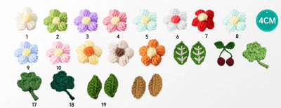 Set of small crocheted flowers and leaves on a white background with size indicator.